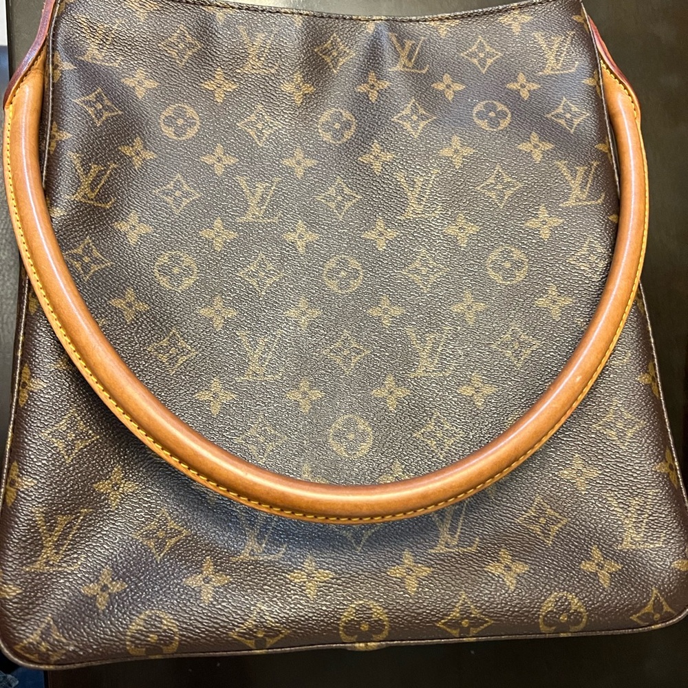 Vintage Louis Vuitton. No visible tears or damage. Immaculate interior